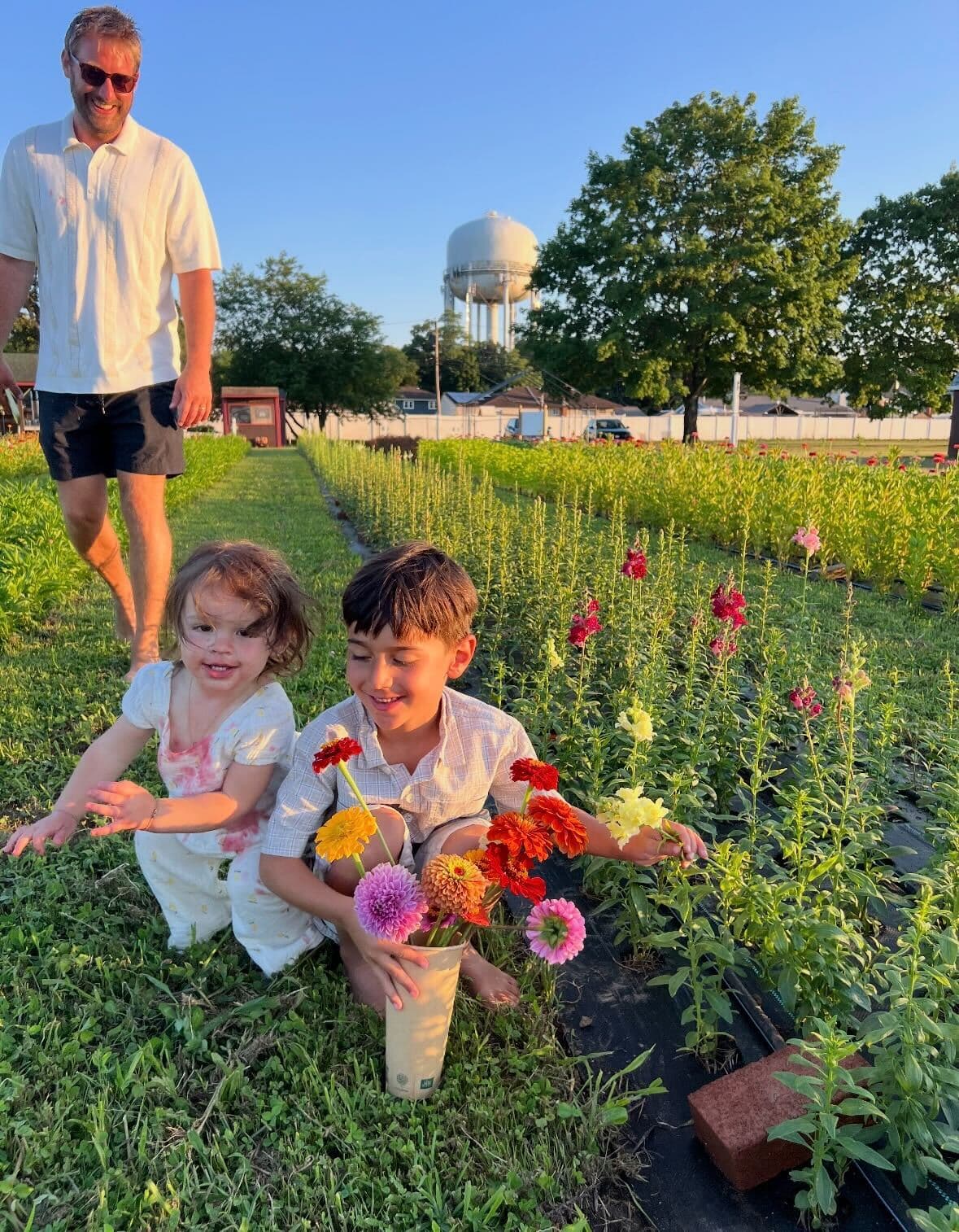 Kids with flowers in the field